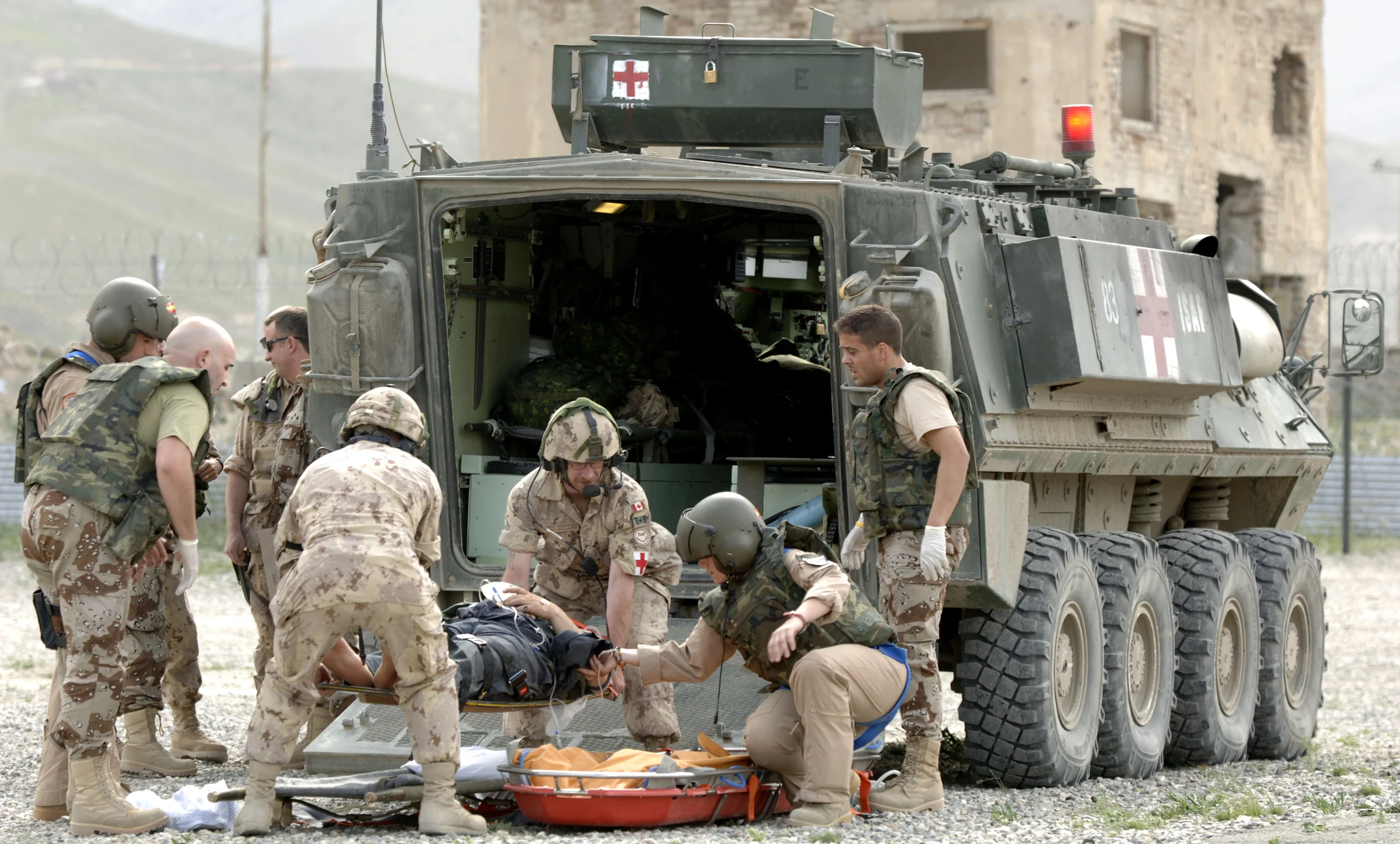 Wheeled armoured ambulance and medical team in Afghanistan